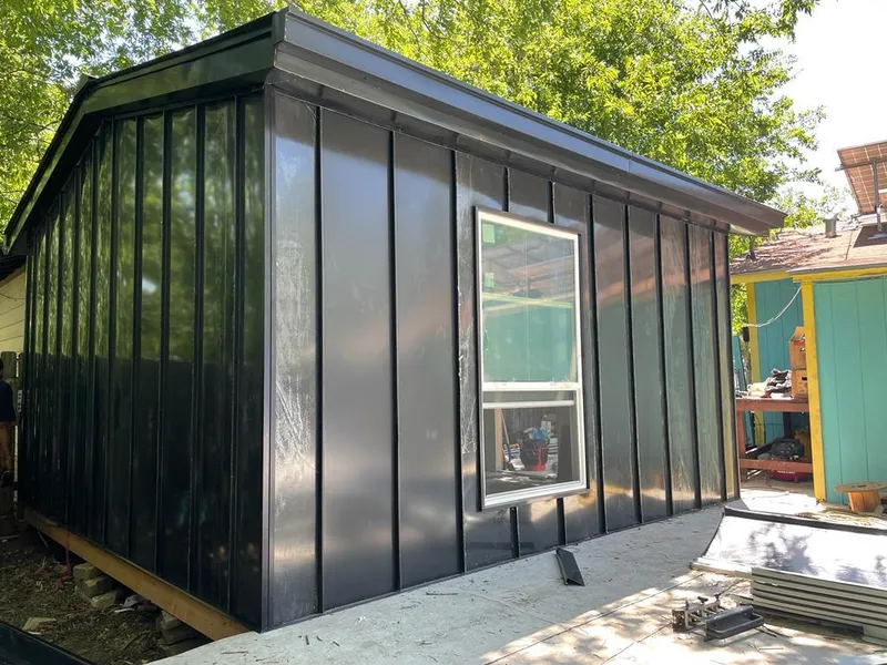 Black standing seam metal wall panels for Metal Roof Installation in Bethalto