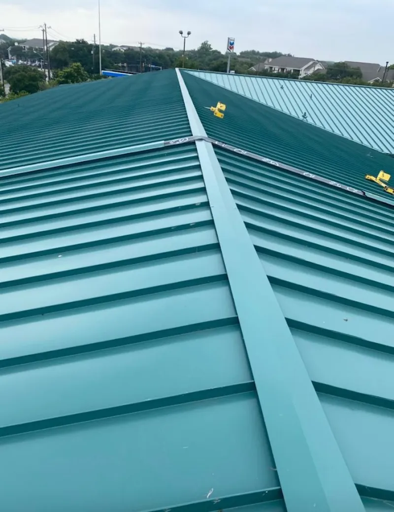 Green commercial metal roof ridge and valley for Metal Roof Repair in Bethalto