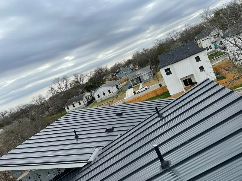 Standing seam metal roof panels with vents for Skylight Repair in Bethalto